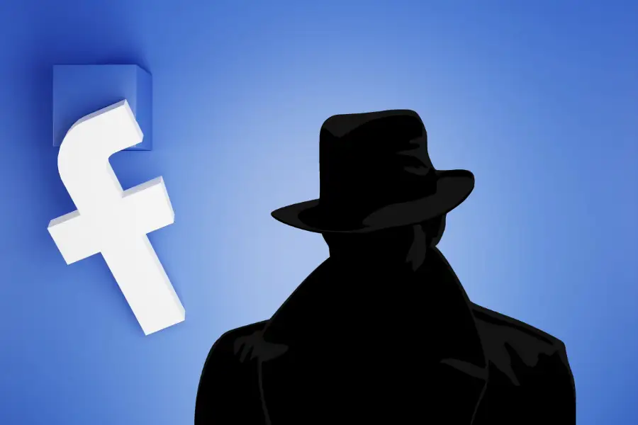 Facebook hacer perfil privado Facebook y una persona en la sombra en primer plano
